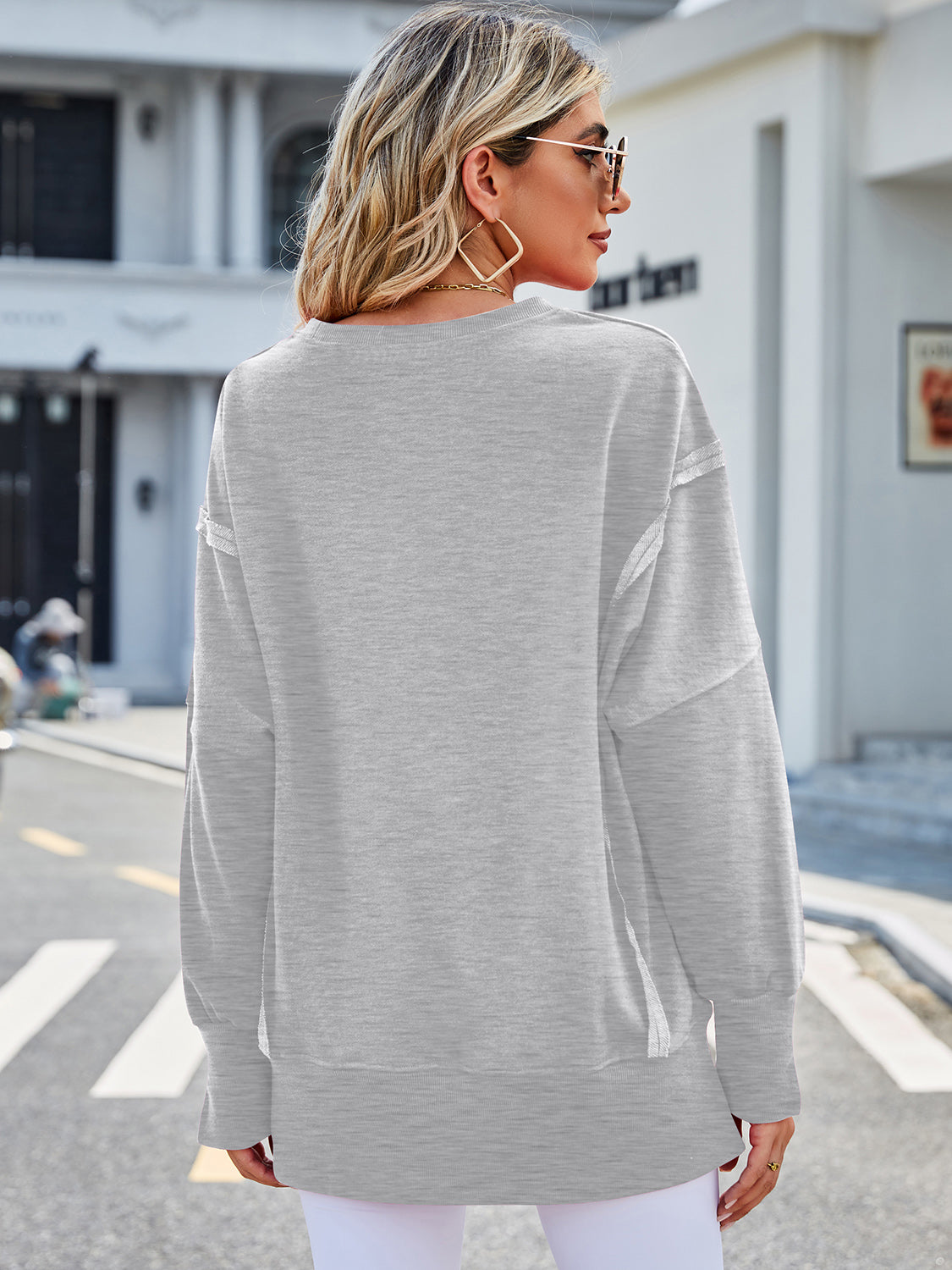 Lovelet Exposed Seam High-Low Round Neck Sweatshirt