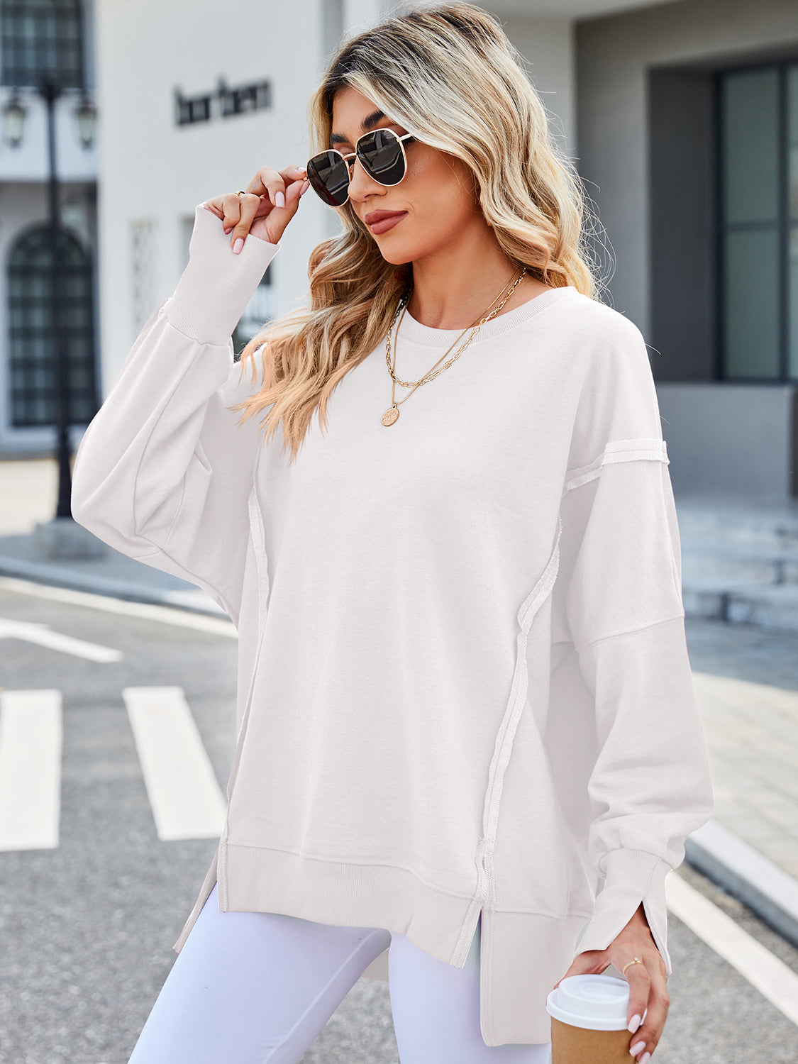 Lovelet Exposed Seam High-Low Round Neck Sweatshirt