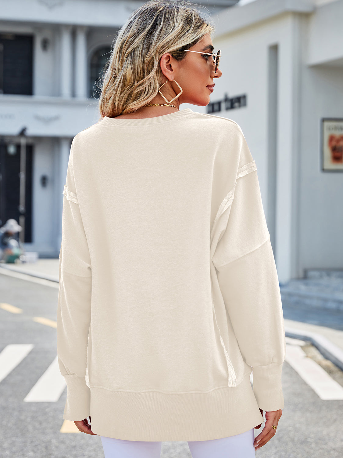 Lovelet Exposed Seam High-Low Round Neck Sweatshirt