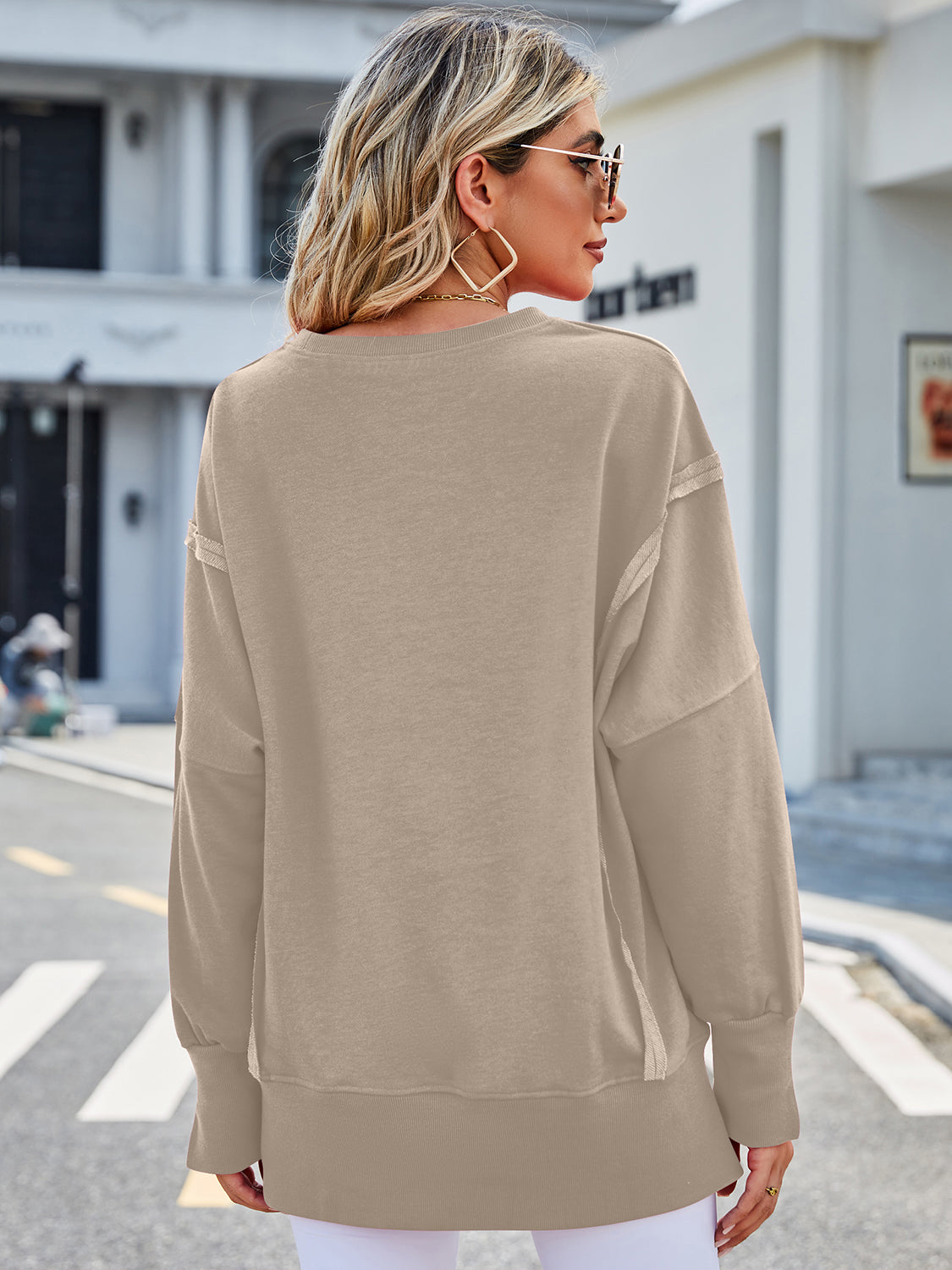 Lovelet Exposed Seam High-Low Round Neck Sweatshirt